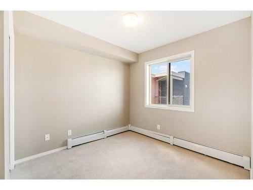 404-15 Saddlestone Way Ne, Calgary, AB - Indoor Photo Showing Other Room