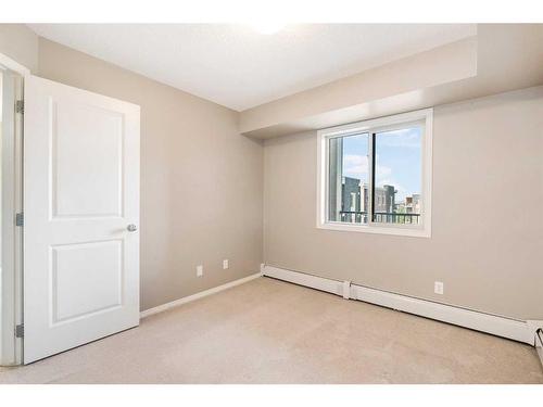 404-15 Saddlestone Way Ne, Calgary, AB - Indoor Photo Showing Other Room