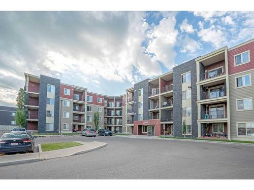 404-15 Saddlestone Way Ne, Calgary, AB - Outdoor With Balcony With Facade