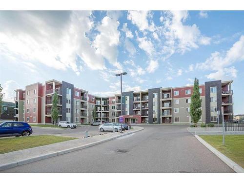 404-15 Saddlestone Way Ne, Calgary, AB - Outdoor With Balcony With Facade