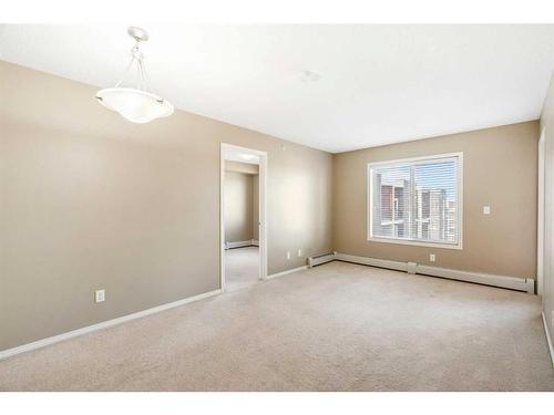 404-15 Saddlestone Way Ne, Calgary, AB - Indoor Photo Showing Other Room