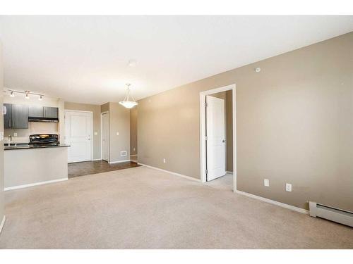 404-15 Saddlestone Way Ne, Calgary, AB - Indoor Photo Showing Kitchen