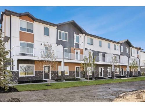 #305-280 Chelsea Road, Chestermere, AB - Outdoor With Balcony With Facade