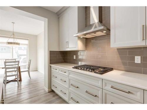 33 Sage Bluff Close Nw, Calgary, AB - Indoor Photo Showing Kitchen With Upgraded Kitchen