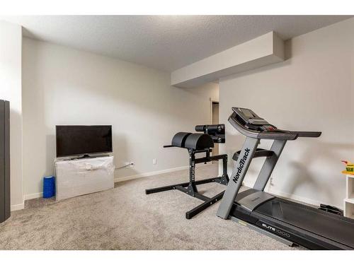 33 Sage Bluff Close Nw, Calgary, AB - Indoor Photo Showing Gym Room