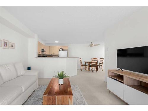 2221-8 Bridlecrest Drive Sw, Calgary, AB - Indoor Photo Showing Living Room