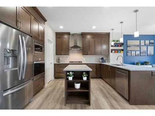 6 Magnolia Manor Se, Calgary, AB - Indoor Photo Showing Kitchen With Upgraded Kitchen