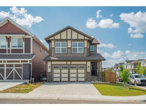 6 Magnolia Manor Se, Calgary, AB - Outdoor With Facade