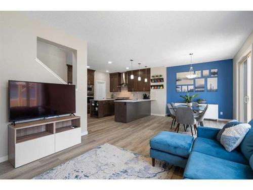 6 Magnolia Manor Se, Calgary, AB - Indoor Photo Showing Living Room