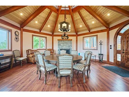 1661 St Andrews Place Nw, Calgary, AB - Indoor Photo Showing Dining Room With Fireplace