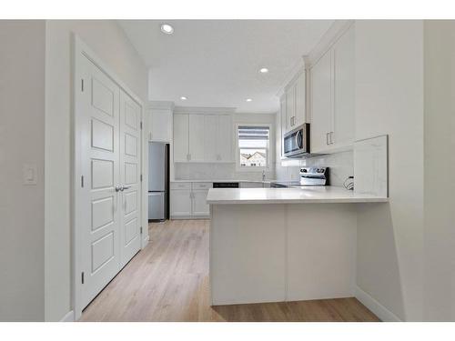 126 Cornerstone Road Ne, Calgary, AB - Indoor Photo Showing Kitchen With Upgraded Kitchen