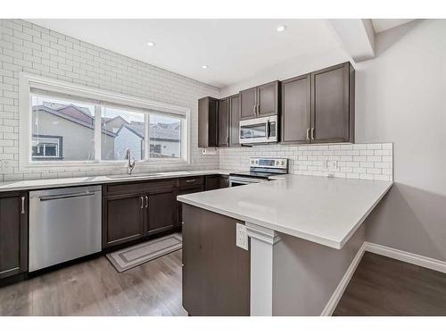 67 Masters Crescent Se, Calgary, AB - Indoor Photo Showing Kitchen With Upgraded Kitchen