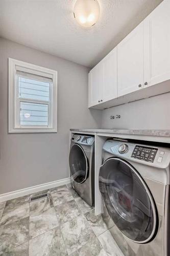 67 Masters Crescent Se, Calgary, AB - Indoor Photo Showing Laundry Room