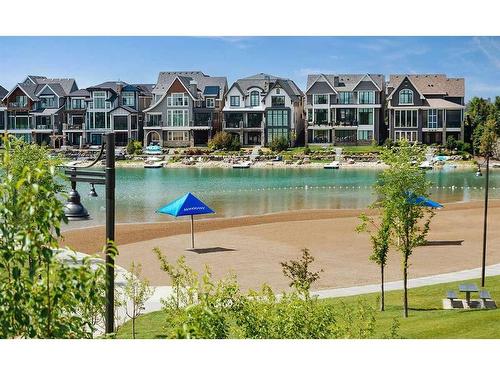 67 Masters Crescent Se, Calgary, AB - Outdoor With Body Of Water