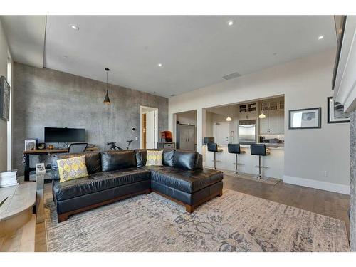 503-201 Quarry Way Se, Calgary, AB - Indoor Photo Showing Living Room