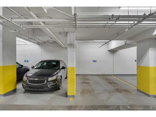 503-201 Quarry Way Se, Calgary, AB - Indoor Photo Showing Garage