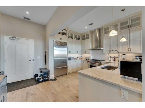 503-201 Quarry Way Se, Calgary, AB - Indoor Photo Showing Kitchen With Upgraded Kitchen