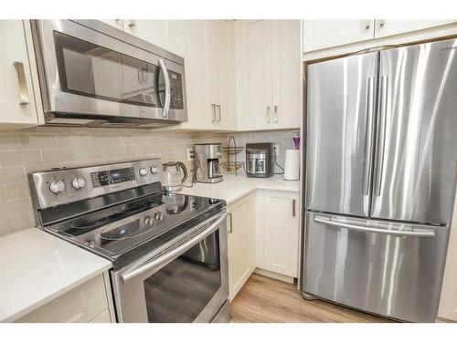 509-355 Nolancrest Heights Nw, Calgary, AB - Indoor Photo Showing Kitchen With Stainless Steel Kitchen