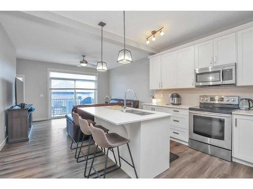 509-355 Nolancrest Heights Nw, Calgary, AB - Indoor Photo Showing Kitchen With Stainless Steel Kitchen