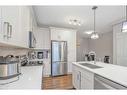 509-355 Nolancrest Heights Nw, Calgary, AB  - Indoor Photo Showing Kitchen With Stainless Steel Kitchen With Double Sink 