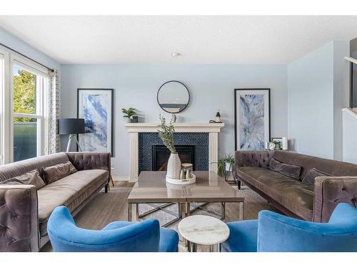 225 Auburn Glen Manor Se, Calgary, AB - Indoor Photo Showing Living Room With Fireplace