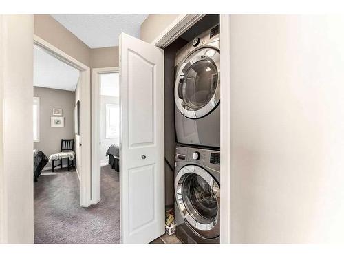 69 Cranberry Avenue Se, Calgary, AB - Indoor Photo Showing Laundry Room