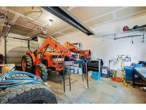 231192 Forestry Way, Rural Rocky View County, AB - Indoor Photo Showing Garage