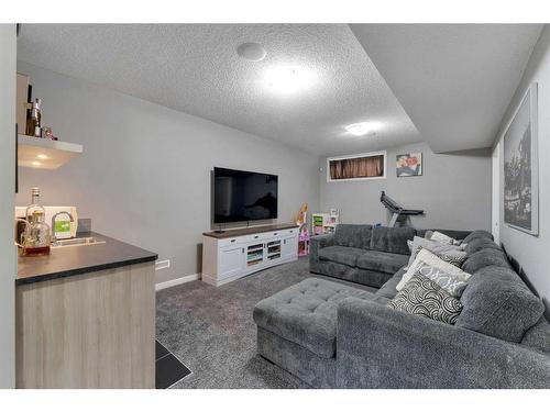 383 Redstone Drive Ne, Calgary, AB - Indoor Photo Showing Living Room