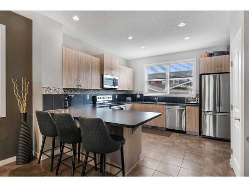 383 Redstone Drive Ne, Calgary, AB - Indoor Photo Showing Kitchen With Stainless Steel Kitchen