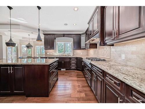 4 Rockcliff Point Nw, Calgary, AB - Indoor Photo Showing Kitchen With Upgraded Kitchen