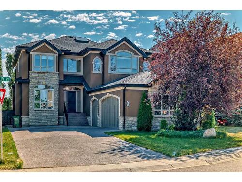 4 Rockcliff Point Nw, Calgary, AB - Outdoor With Facade