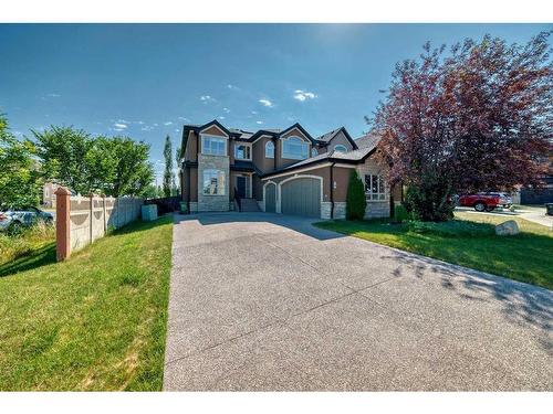 4 Rockcliff Point Nw, Calgary, AB - Outdoor With Facade