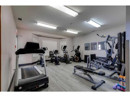 .-2307 Sienna Park Green Sw, Calgary, AB - Indoor Photo Showing Gym Room