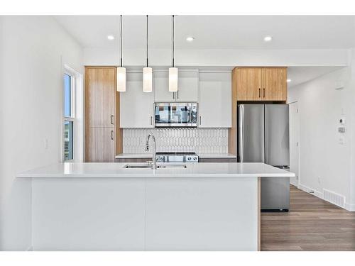 14-2117 81 Street Sw, Calgary, AB - Indoor Photo Showing Kitchen With Upgraded Kitchen