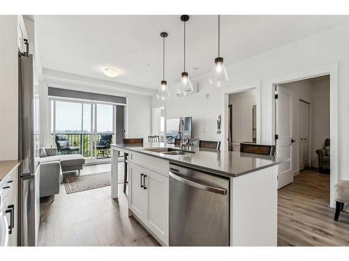 5204-200 Seton Circle Se, Calgary, AB - Indoor Photo Showing Kitchen With Stainless Steel Kitchen With Double Sink With Upgraded Kitchen