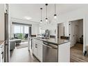 5204-200 Seton Circle Se, Calgary, AB  - Indoor Photo Showing Kitchen With Stainless Steel Kitchen With Double Sink With Upgraded Kitchen 