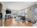 1607-910 5 Avenue Sw, Calgary, AB  - Indoor Photo Showing Living Room With Fireplace 