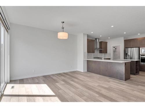 105 Creekstone Path Sw, Calgary, AB - Indoor Photo Showing Kitchen With Upgraded Kitchen