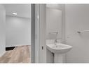 105 Creekstone Path Sw, Calgary, AB  - Indoor Photo Showing Bathroom 