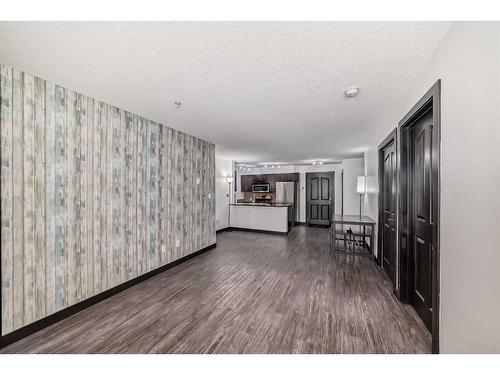 2111-403 Mackenzie Way Sw, Airdrie, AB - Indoor Photo Showing Other Room