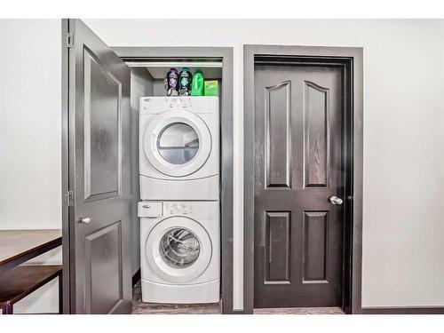 2111-403 Mackenzie Way Sw, Airdrie, AB - Indoor Photo Showing Laundry Room