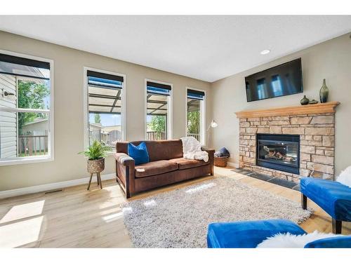 143 Prestwick Point Se, Calgary, AB - Indoor Photo Showing Living Room With Fireplace