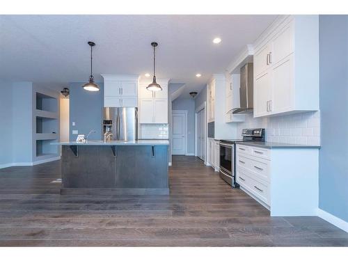 46 Bridleridge Green Sw, Calgary, AB - Indoor Photo Showing Kitchen With Upgraded Kitchen