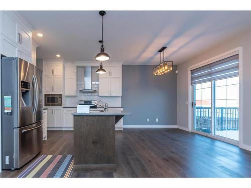 46 Bridleridge Green Sw, Calgary, AB - Indoor Photo Showing Kitchen