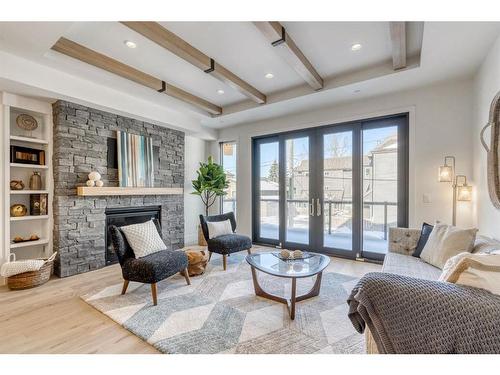 2 (Se)-833 6Th Street, Canmore, AB - Indoor Photo Showing Living Room With Fireplace