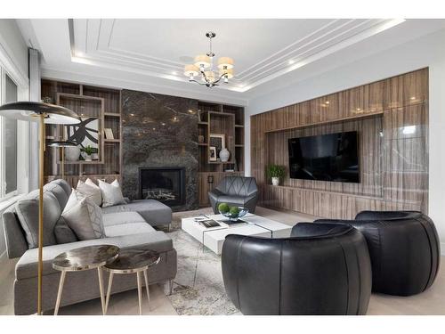 2543 11 Avenue Nw, Calgary, AB - Indoor Photo Showing Living Room With Fireplace