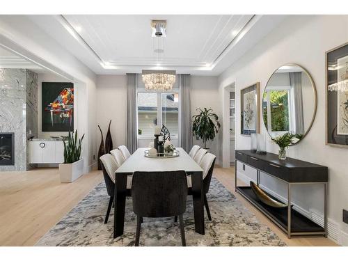 2543 11 Avenue Nw, Calgary, AB - Indoor Photo Showing Dining Room With Fireplace