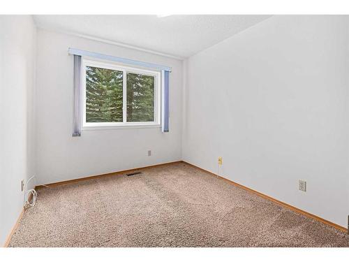 61 Sandarac Circle Nw, Calgary, AB - Indoor Photo Showing Other Room