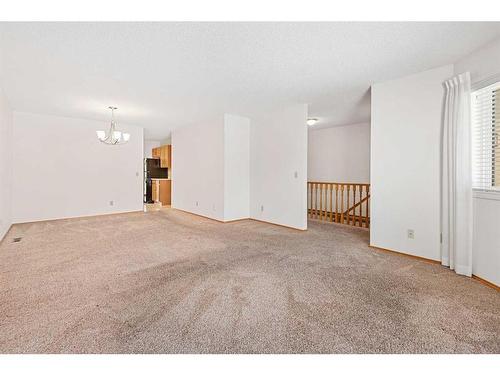 61 Sandarac Circle Nw, Calgary, AB - Indoor Photo Showing Other Room