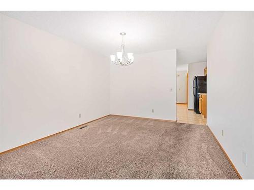 61 Sandarac Circle Nw, Calgary, AB - Indoor Photo Showing Other Room